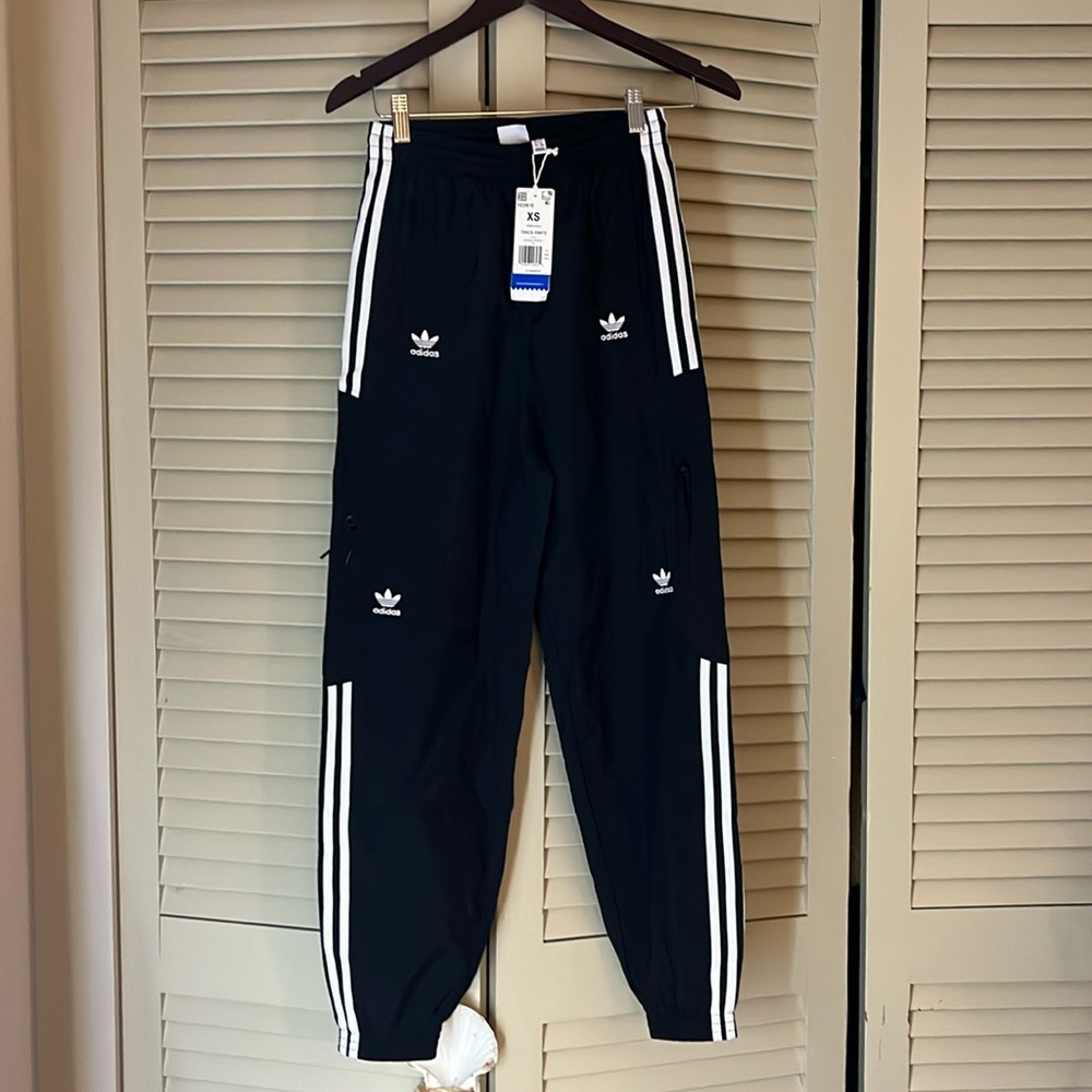 NWT Adidas Rare Adicolor Disrupted Icon Woven Track pants